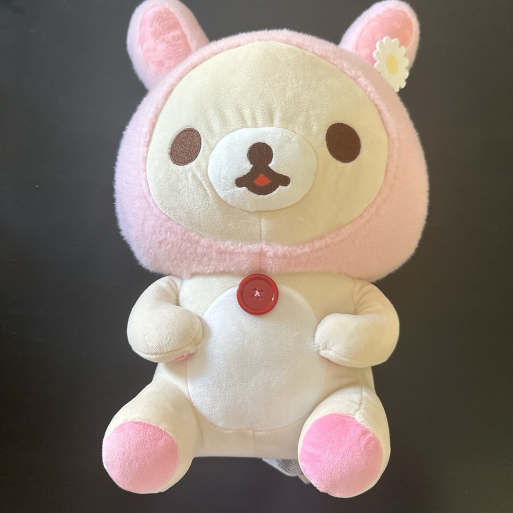 Charming Pink and Cream Stuffed Animal with Button Detail